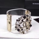 Replica Chanel Resin CC Bloom Crystal Cuff Bracelet Black 2019 Collection AQ00771